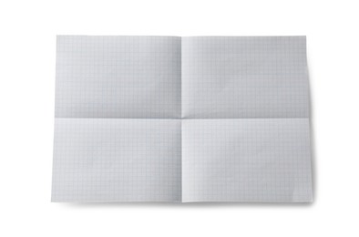 Checkered sheet of paper with creases on white background, top view