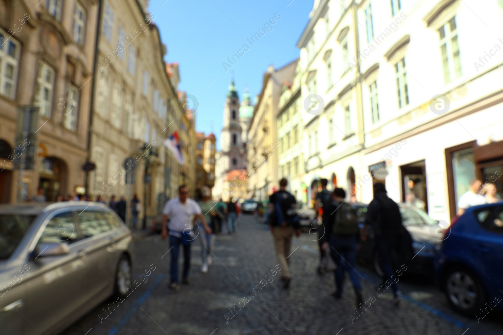 Photo of PRAGUE, CZECH REPUBLIC - APRIL 25, 2019: Blurred view of city street with old buildings