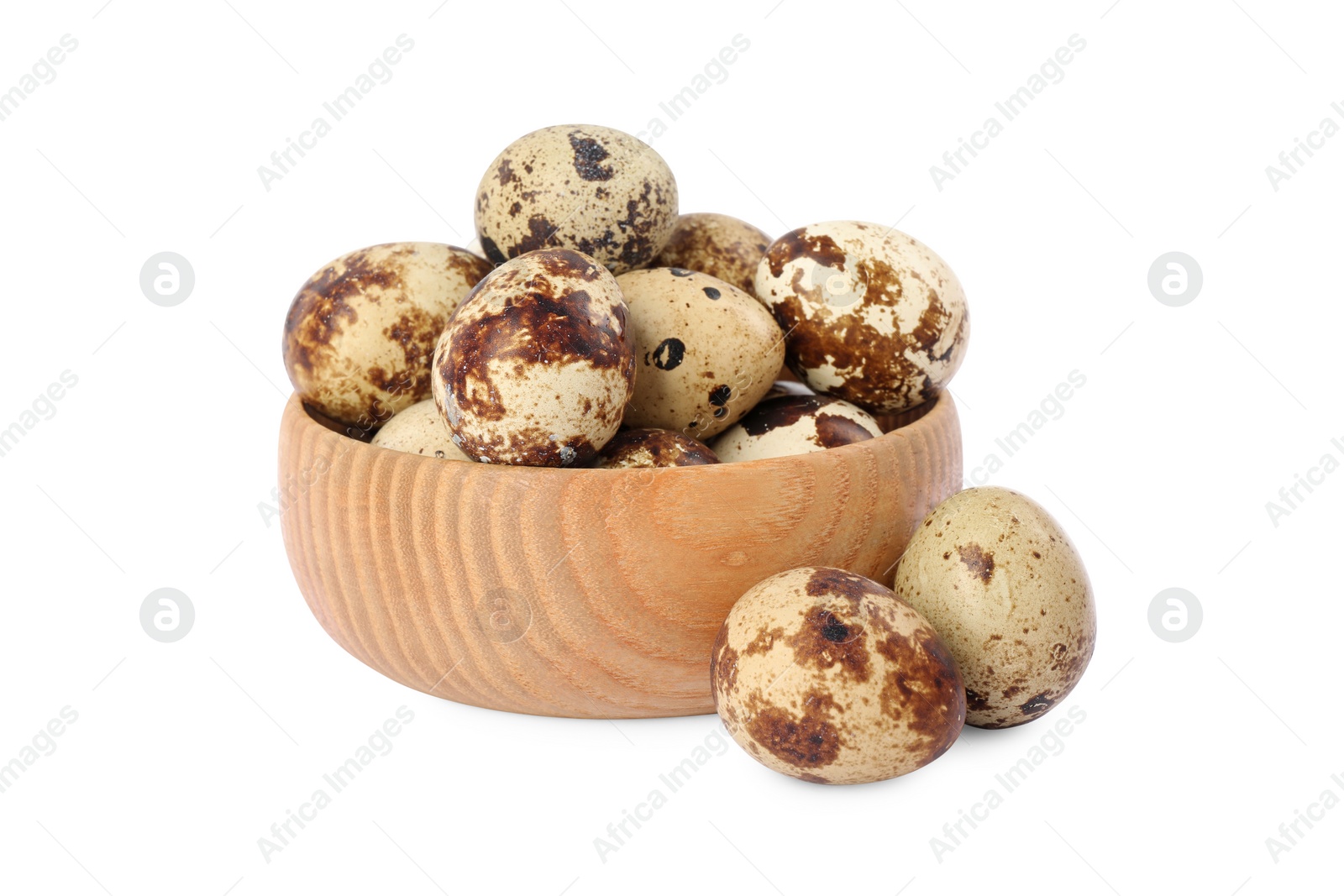 Photo of Wooden bowl and quail eggs isolated on white