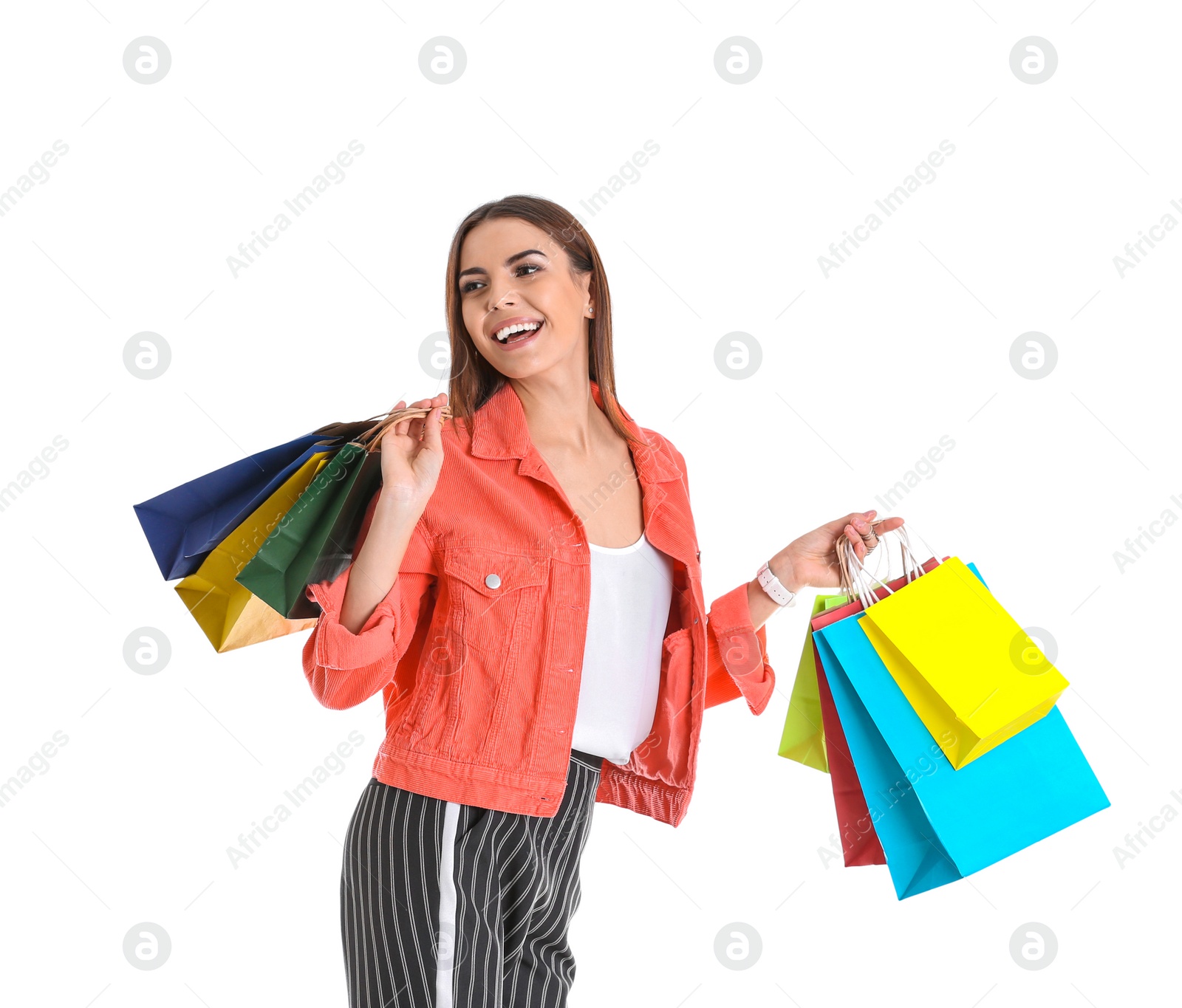 Photo of Young woman with shopping bags on white background