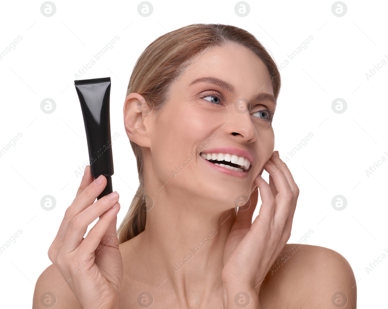 Photo of Woman holding tube with foundation on white background