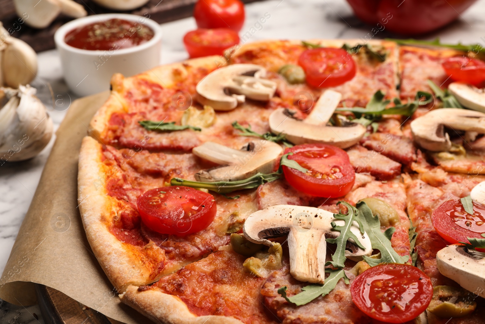 Photo of Hot delicious pizza baked in oven on table, closeup