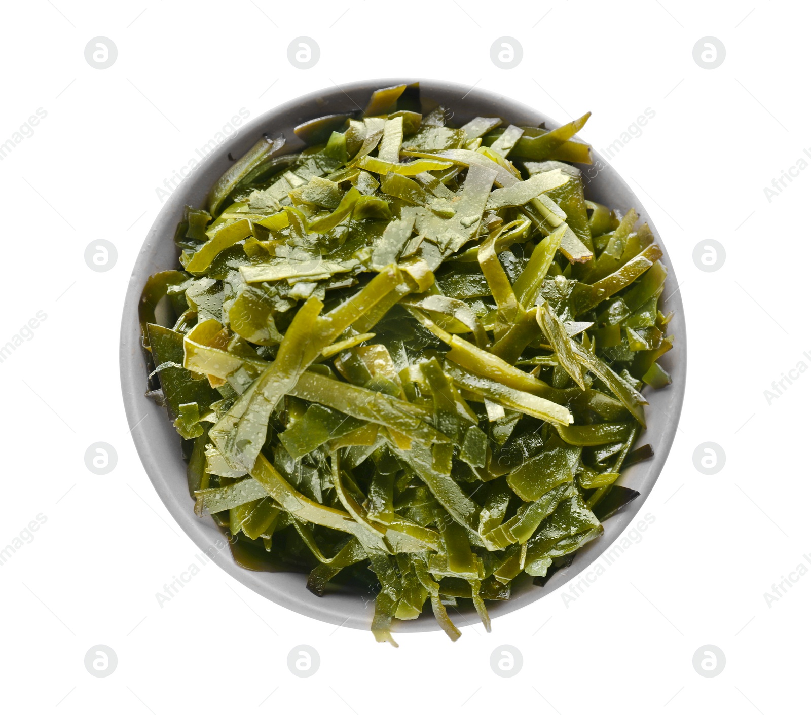 Photo of Fresh laminaria (kelp) seaweed in bowl isolated on white, top view