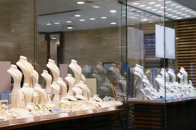 Photo of Showcase with luxury accessories in beautiful shop