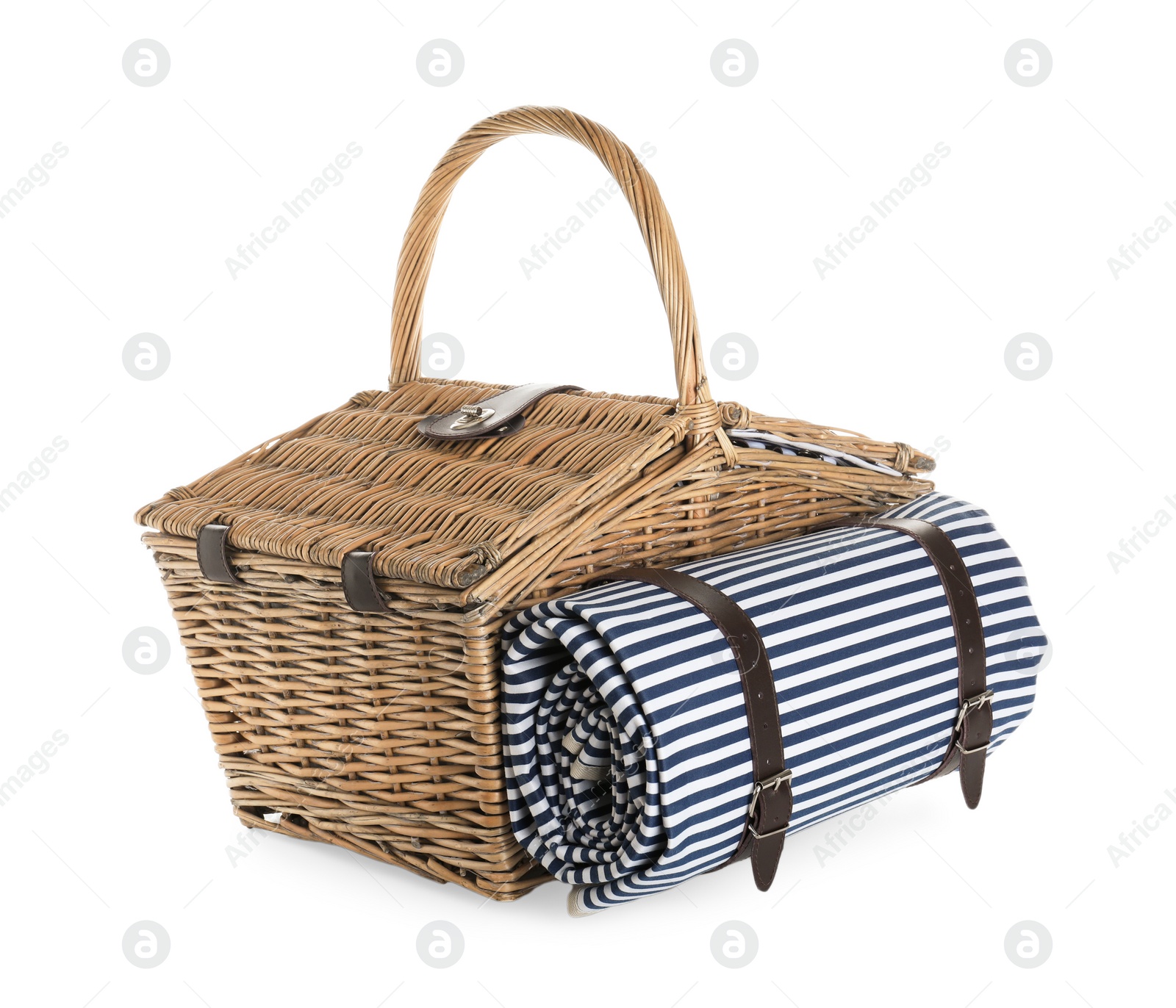 Photo of Closed wicker picnic basket with blanket on white background