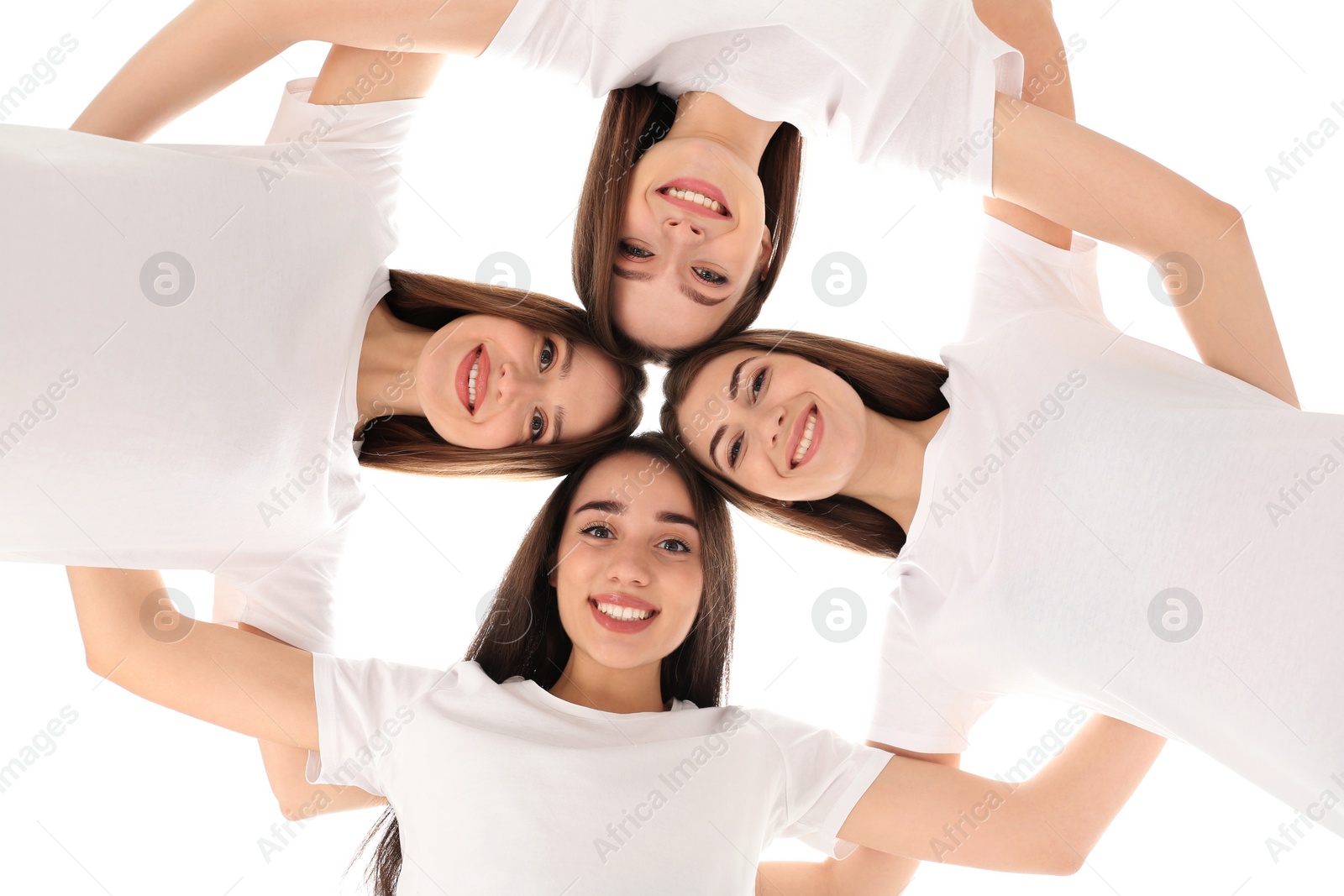 Photo of Beautiful young ladies hugging, bottom view. Woman's Day