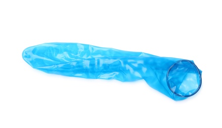 Blue used condom on white background. Safe sex concept