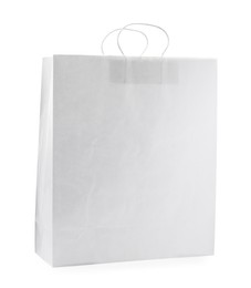 Photo of Empty shopping paper bag isolated on white