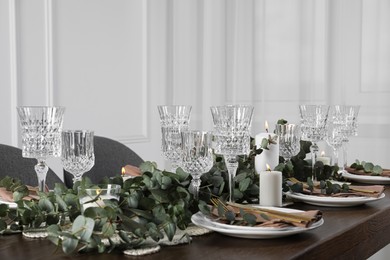 Stylish elegant table setting for festive dinner indoors