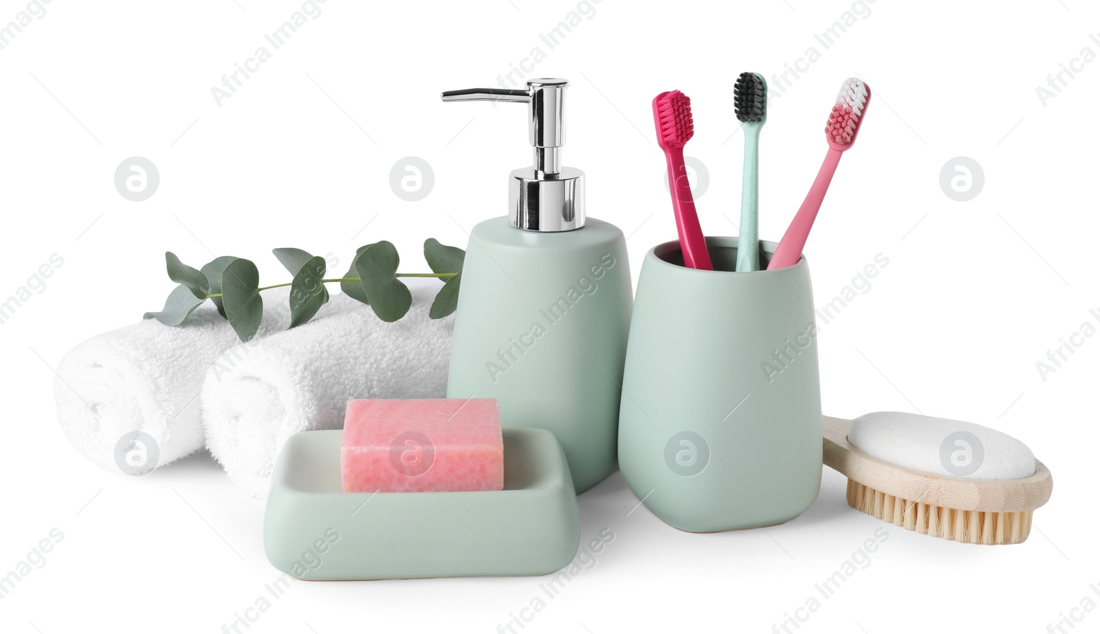 Photo of Bath accessories. Different personal care products and eucalyptus branch isolated on white