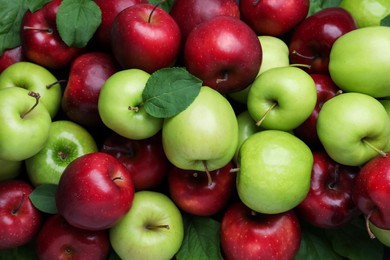 Photo of Fresh ripe green and red apples as background, top view