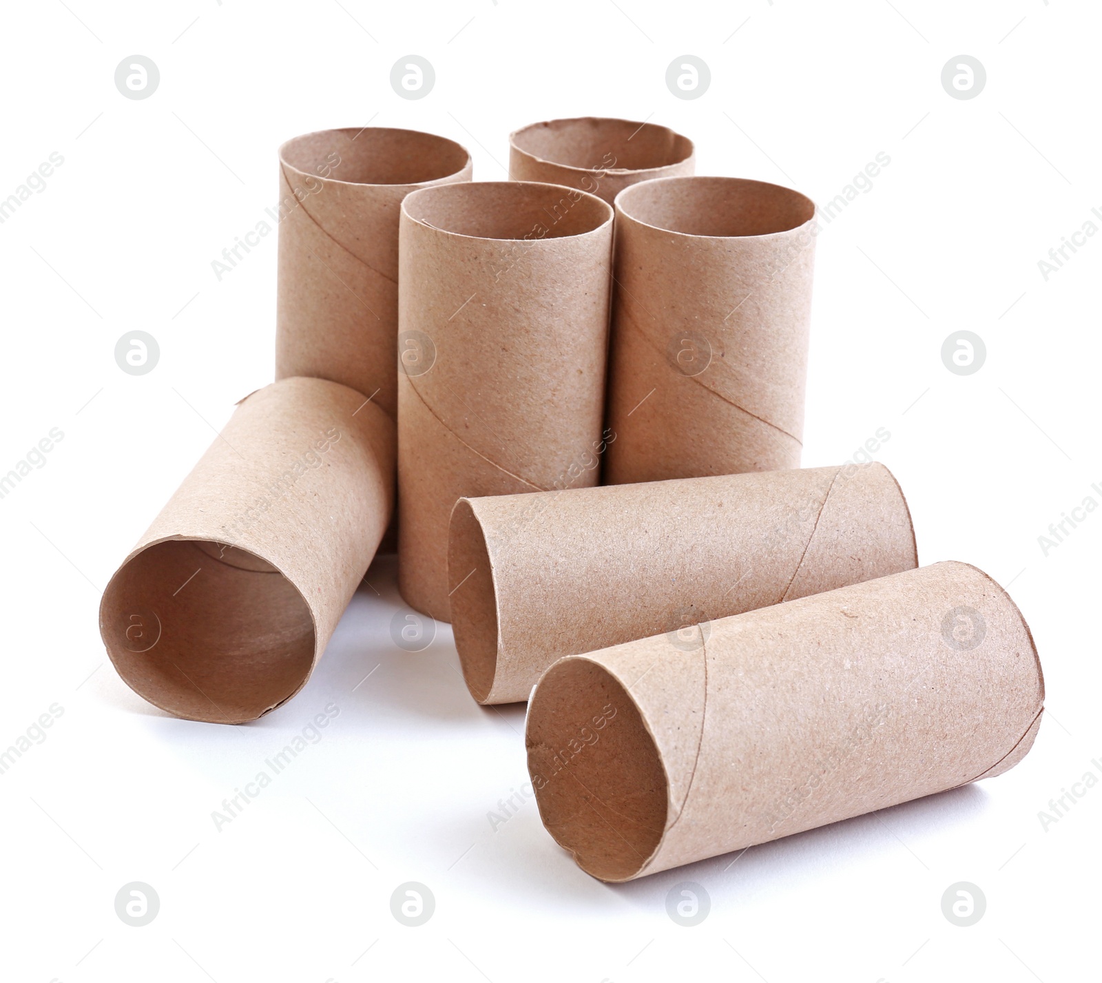 Photo of Empty paper toilet rolls on white background