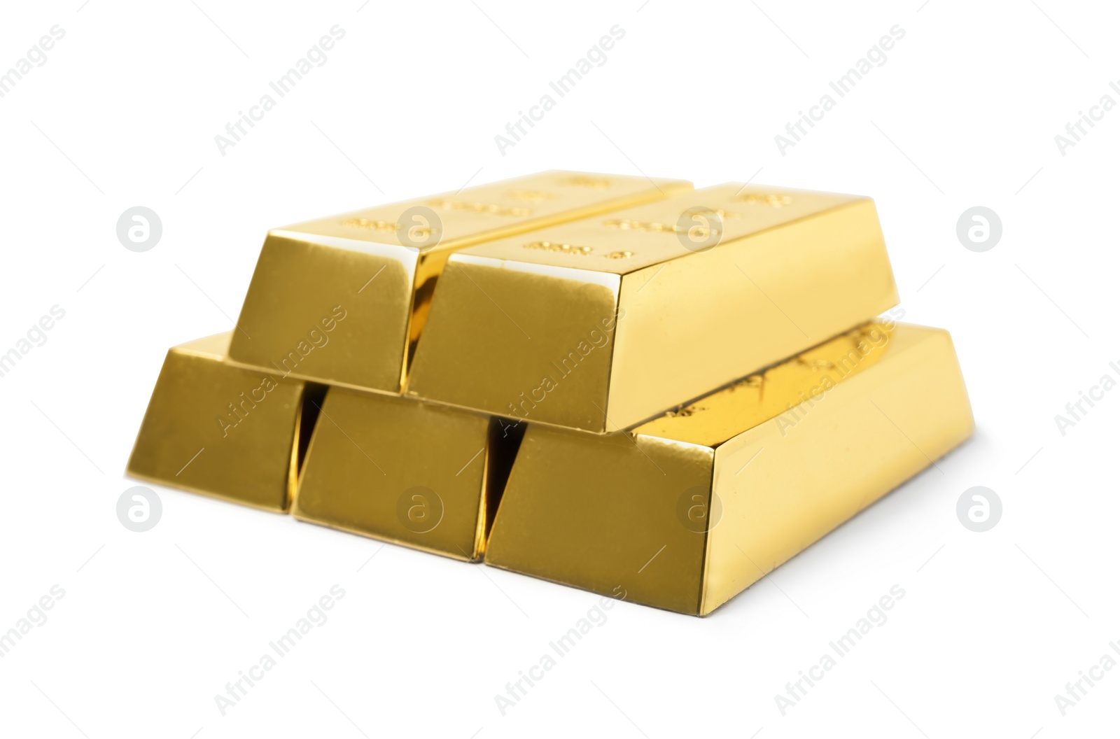 Photo of Stack of shining gold bars isolated on white