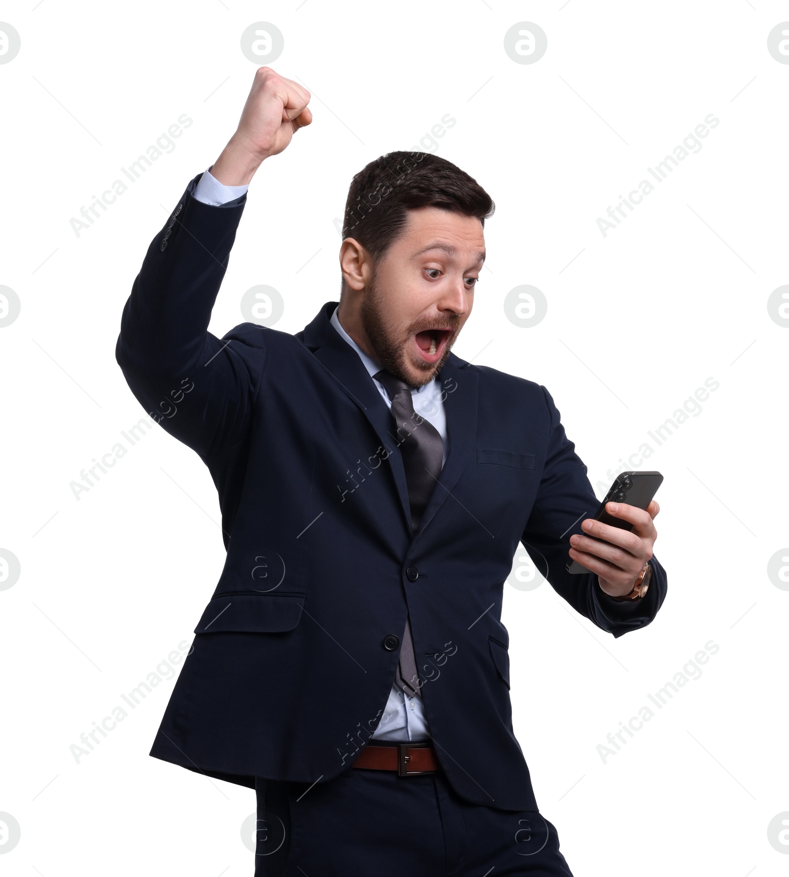 Photo of Handsome bearded businessman in suit using smartphone on white background