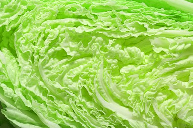 Photo of Fresh ripe Chinese cabbage as background, top view