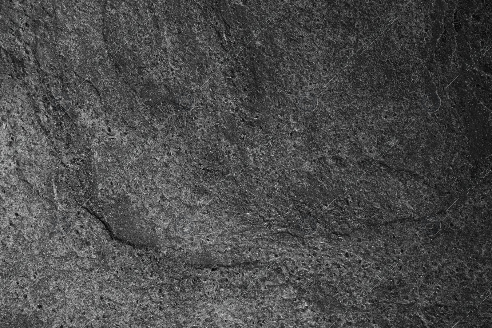 Image of Texture of dark grey stone surface as background, closeup