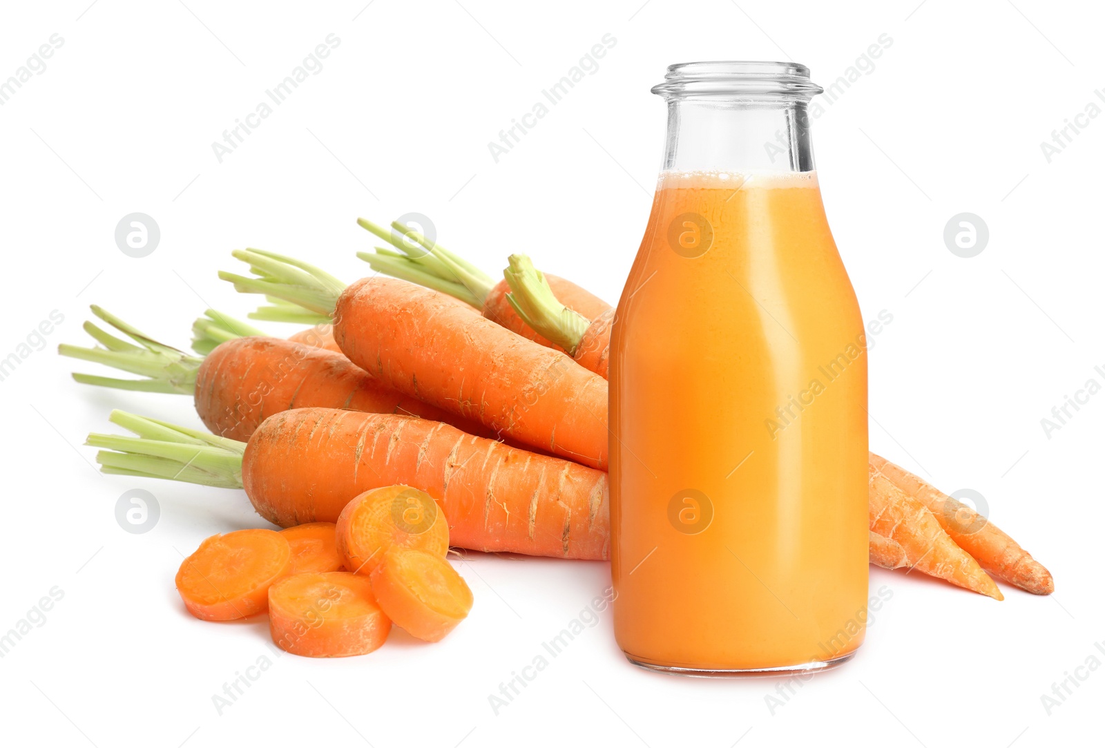 Image of Carrot juice and fresh vegetables on white background