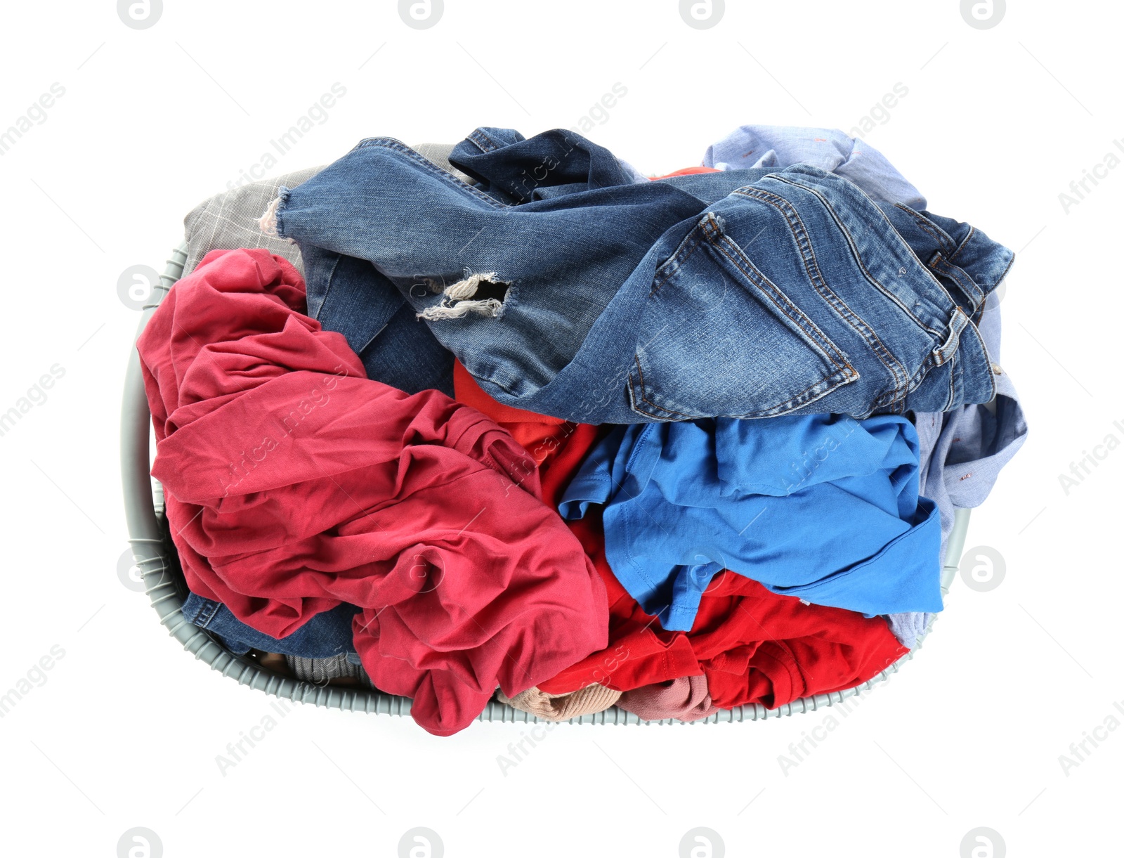 Photo of Plastic laundry basket full of clothes isolated on white, top view