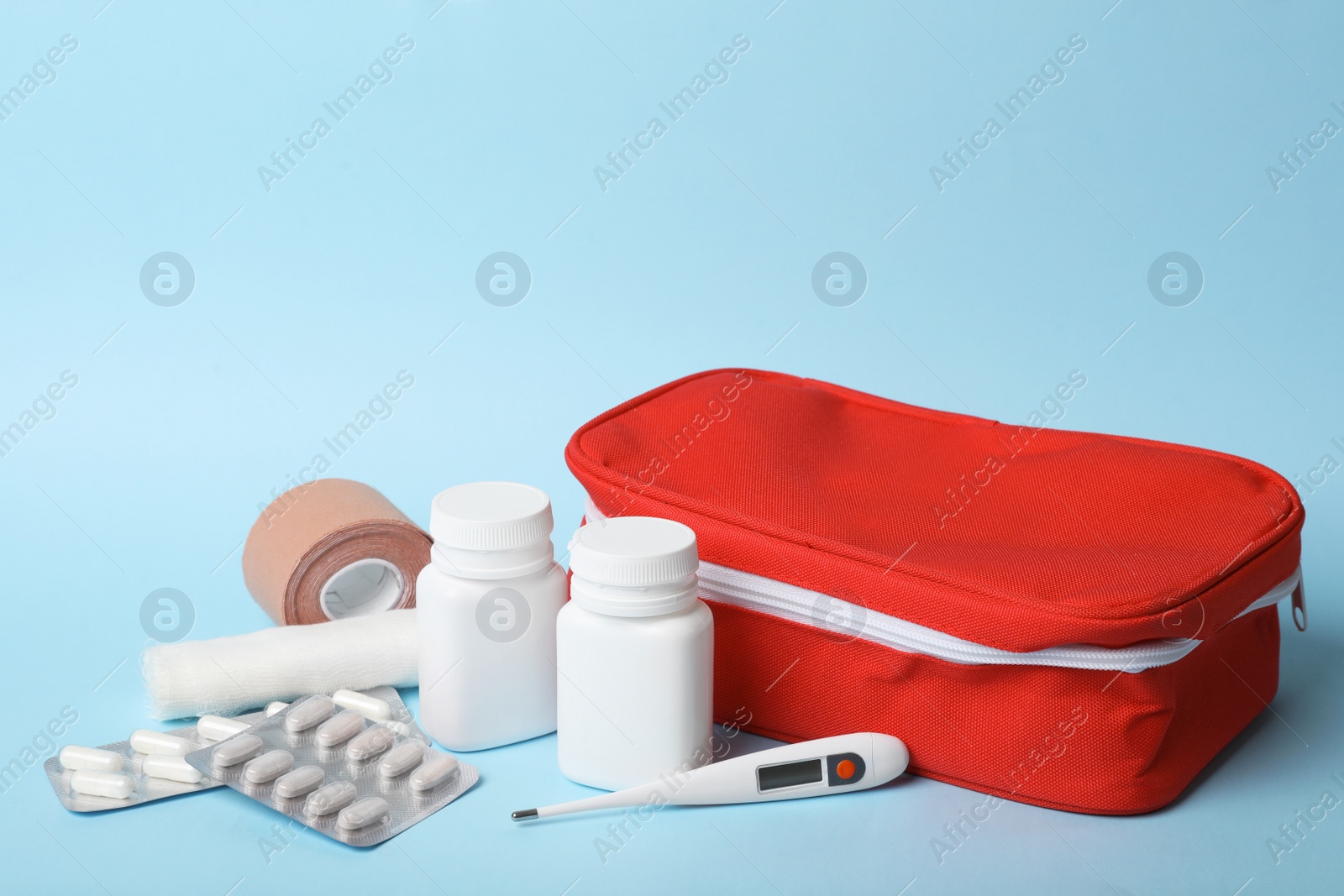 Photo of First aid kit on color background. Health care