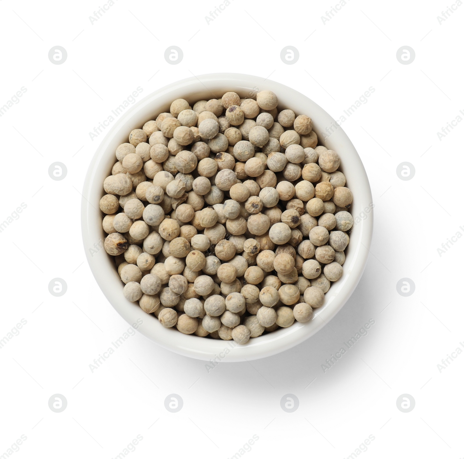 Photo of Aromatic spice. Many peppercorns in bowl isolated on white, top view