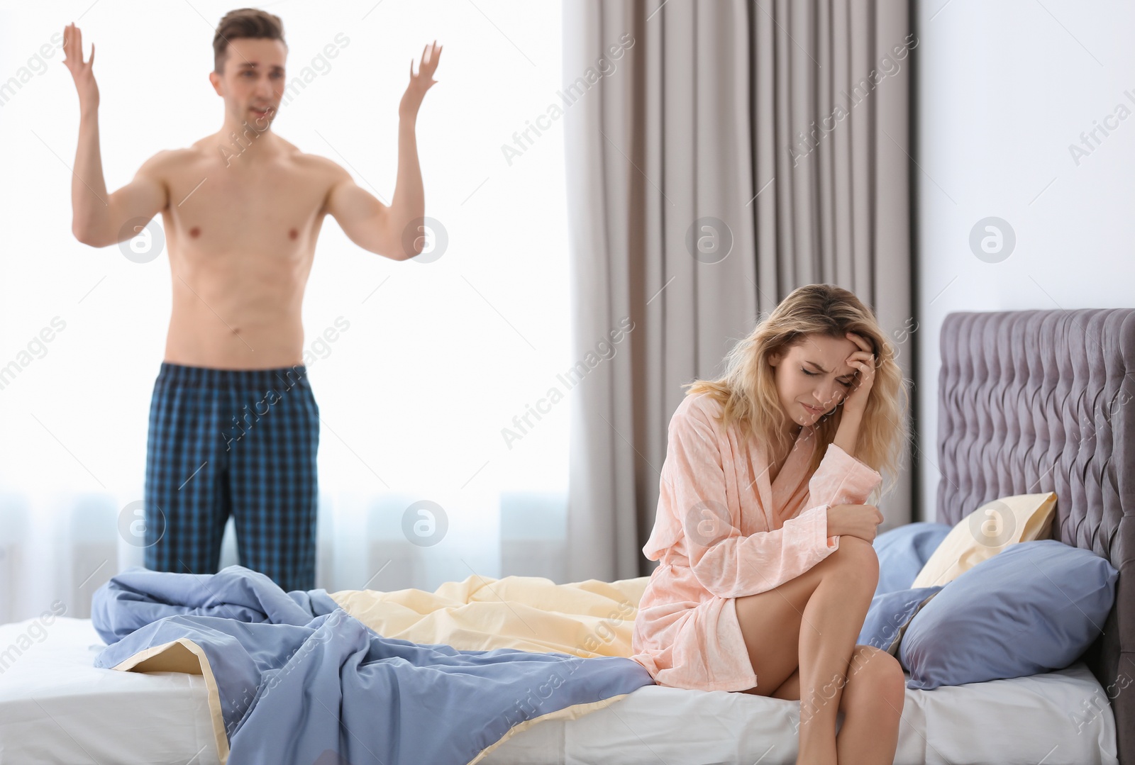 Photo of Young couple with relationship problem at home