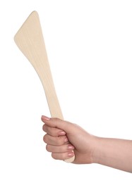 Photo of Woman with wooden spatula on white background, closeup