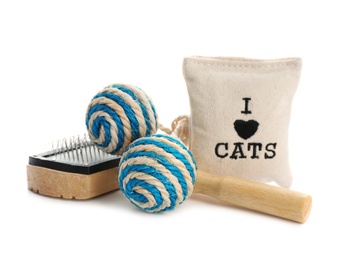 Photo of Cat toys and accessories on white background. Pet care