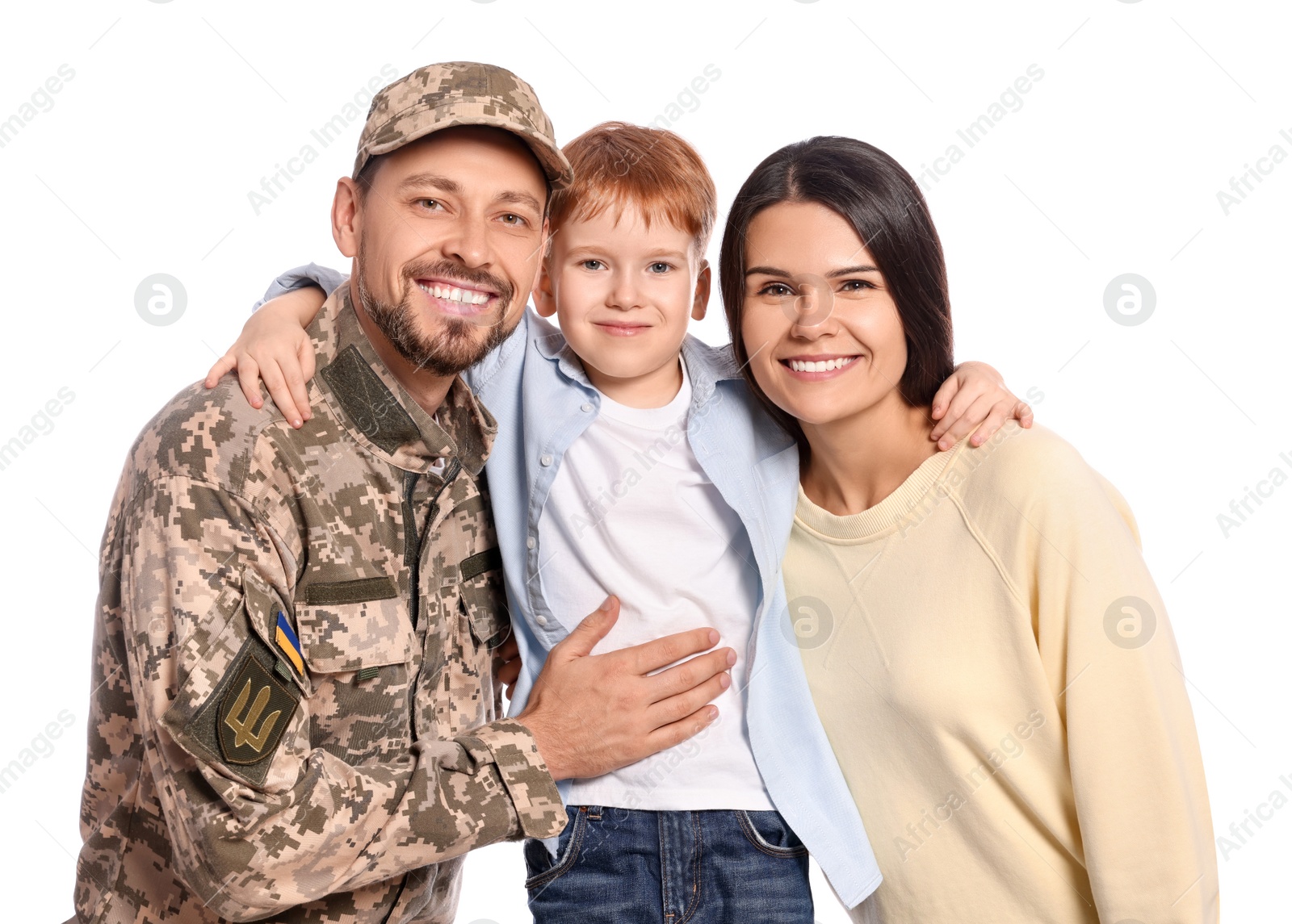 Photo of Ukrainian defender in military uniform with his family on white background