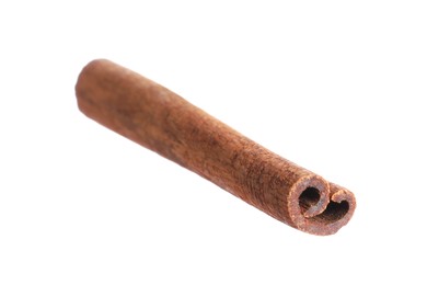 Photo of One aromatic cinnamon stick isolated on white