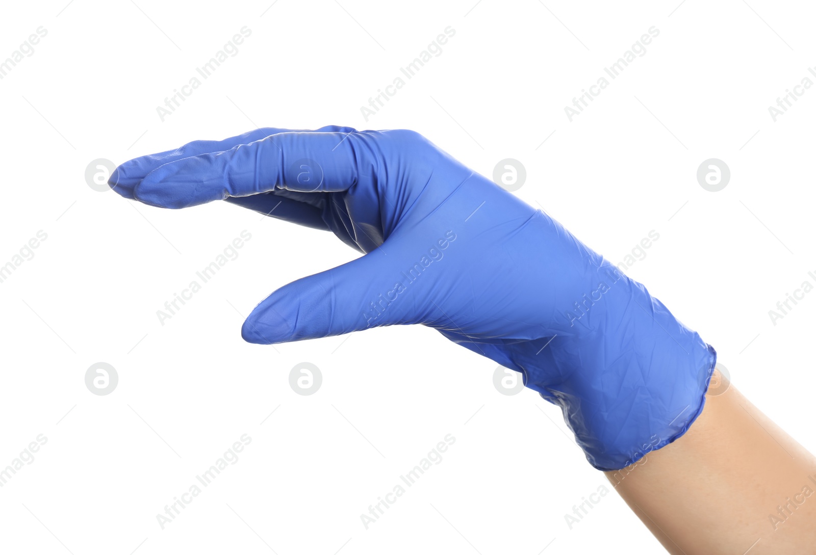 Photo of Woman in blue latex gloves holding something on white background, closeup of hand