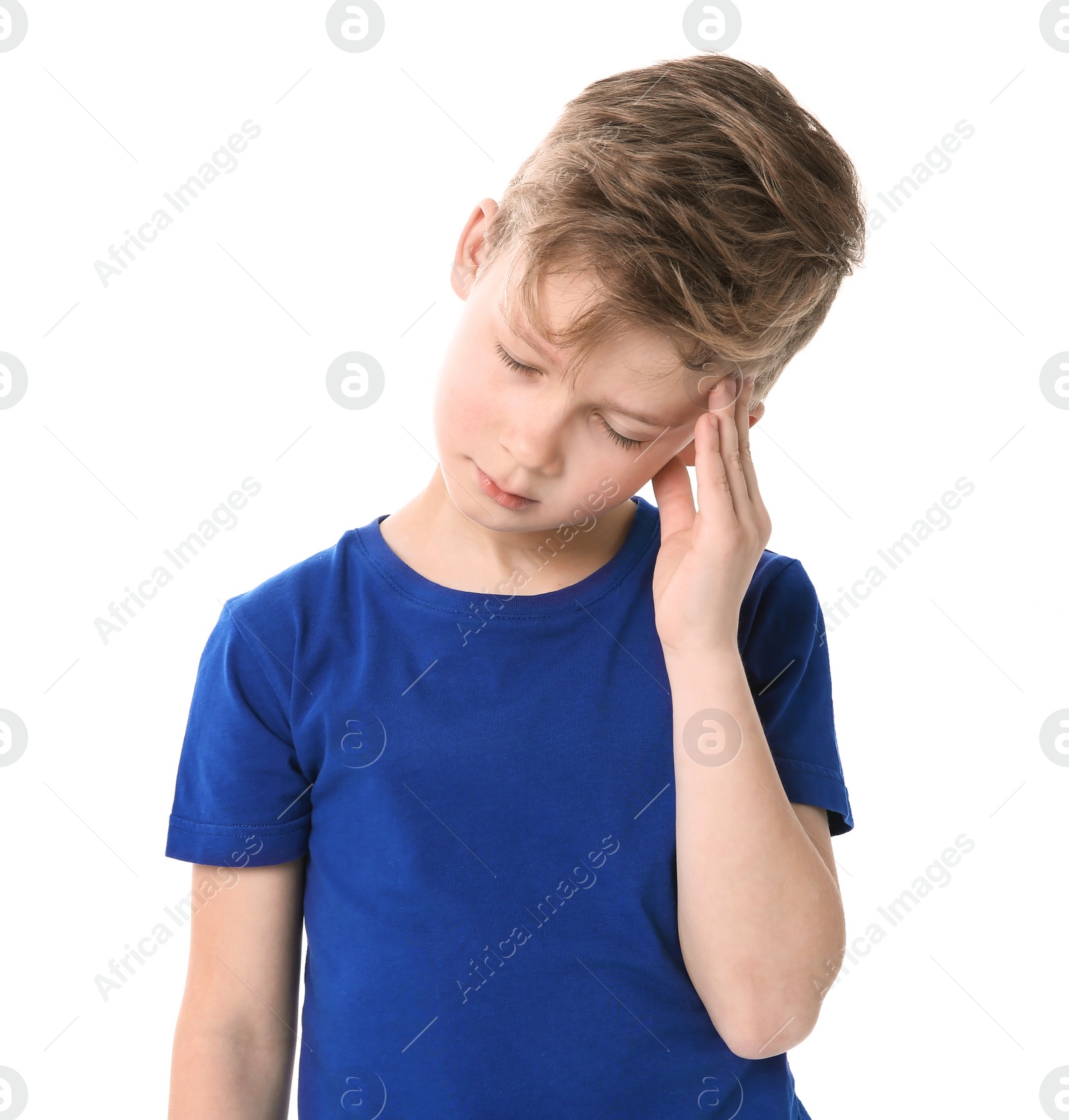 Photo of Little boy suffering from headache on white background