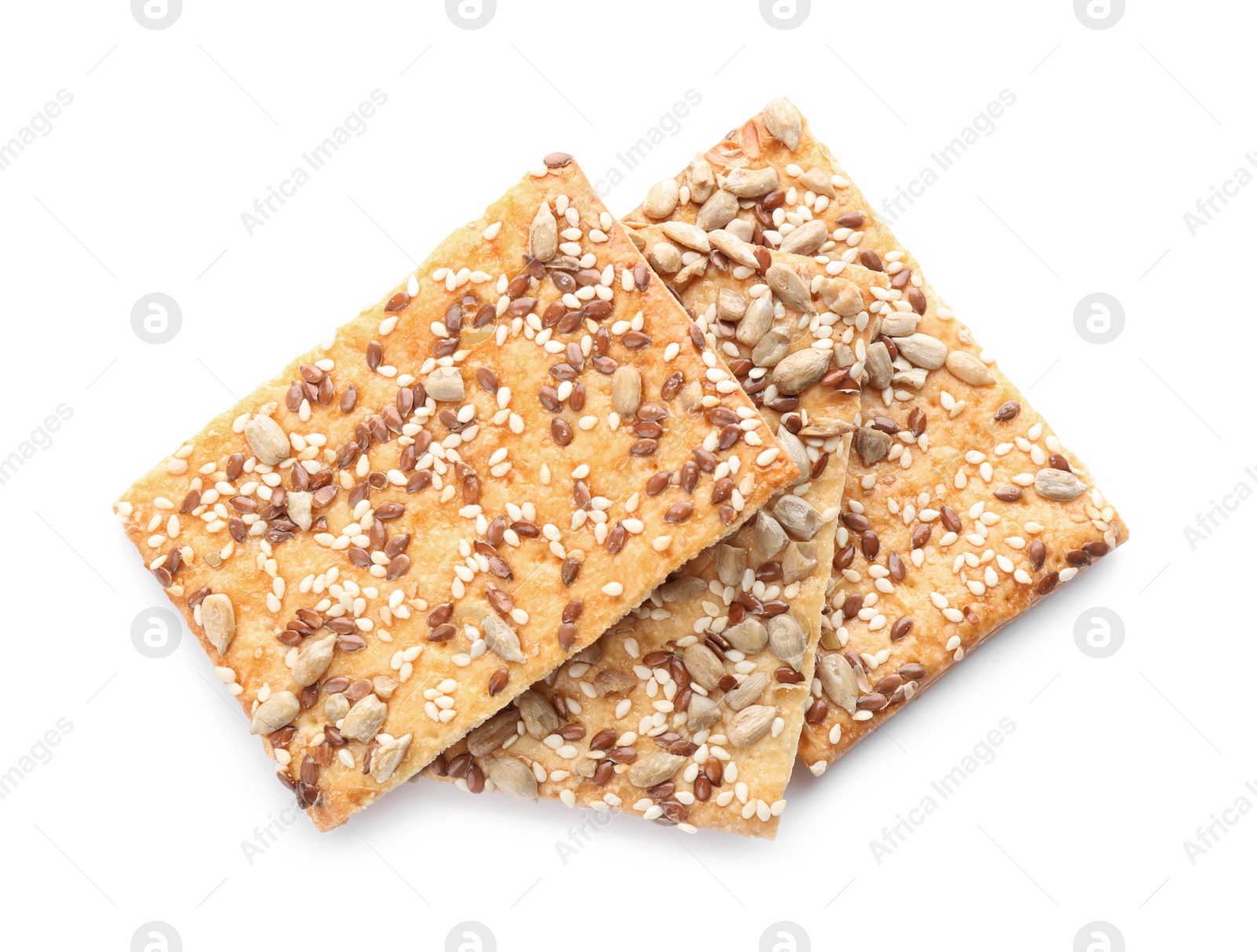 Photo of Delicious crispy crackers with different seeds isolated on white, top view