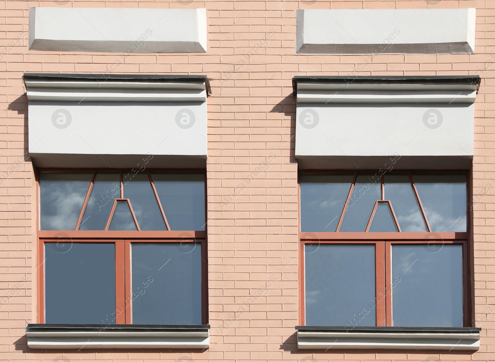 Photo of Wall of vintage building with beautiful windows