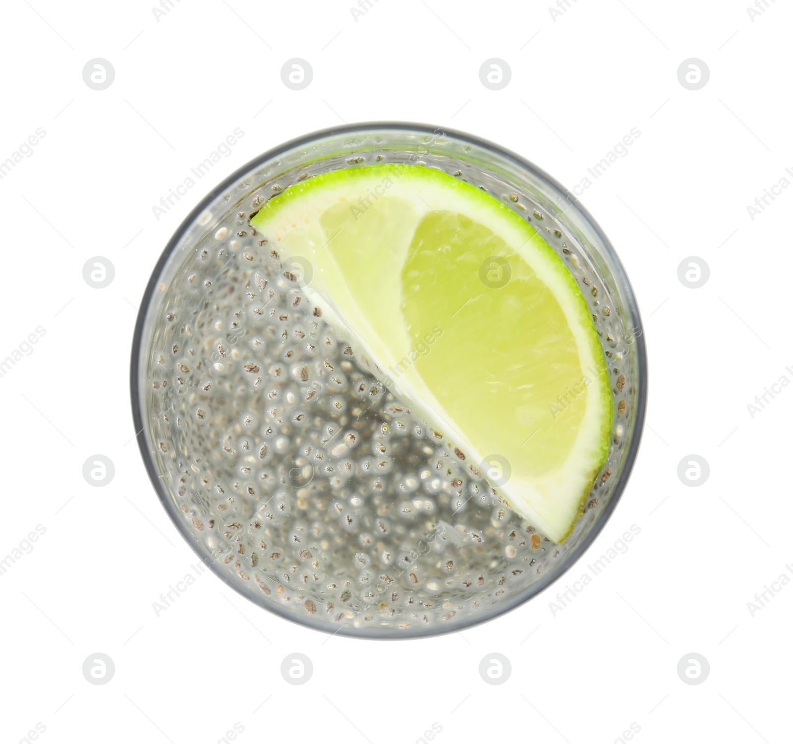 Photo of Glass of water with chia seeds on white background, top view