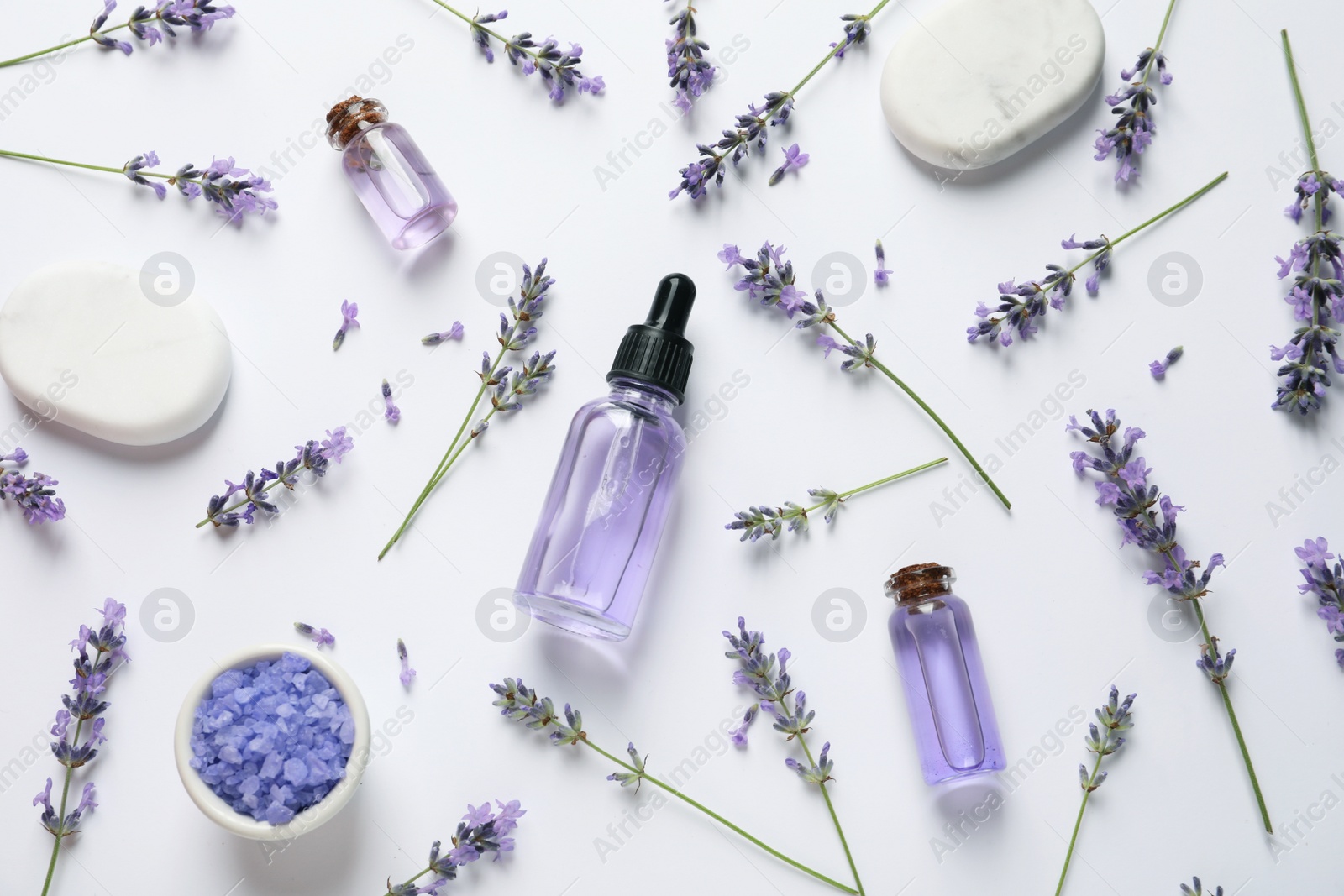 Photo of Composition with natural lavender cosmetic products and flowers on white background, top view