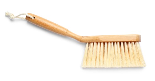 Photo of Wooden brush isolated on white, top view