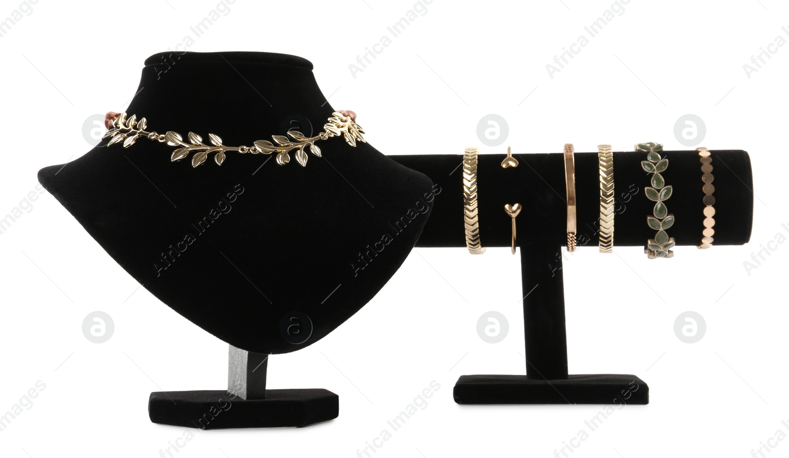 Photo of Different display stands with stylish jewelry on white background