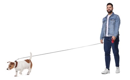 Smiling man walking with dog on white background
