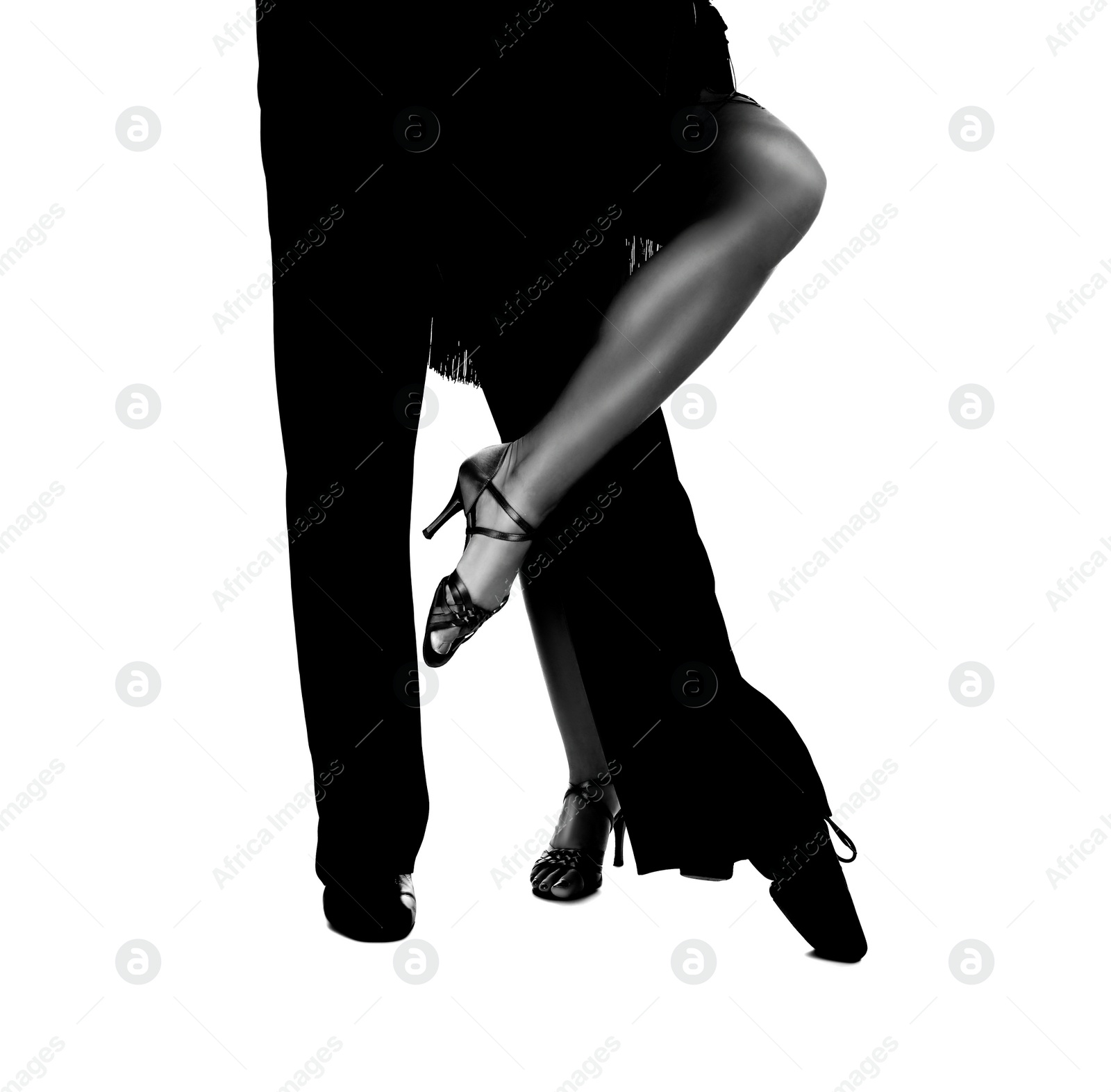 Image of Young couple dancing on white background, closeup of legs