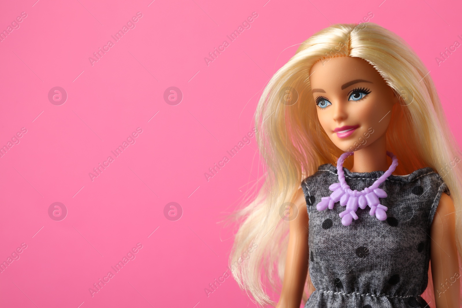 Photo of Mykolaiv, Ukraine - September 4, 2023: Beautiful Barbie doll on pink background, space for text