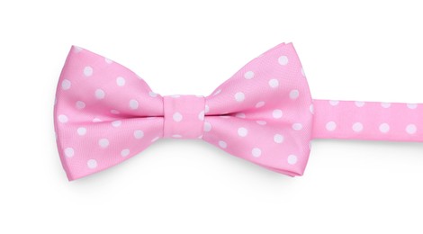 Photo of Stylish pink bow tie with polka dot pattern on white background, top view