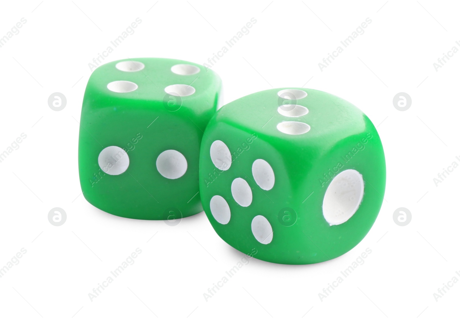 Photo of Two green game dices isolated on white