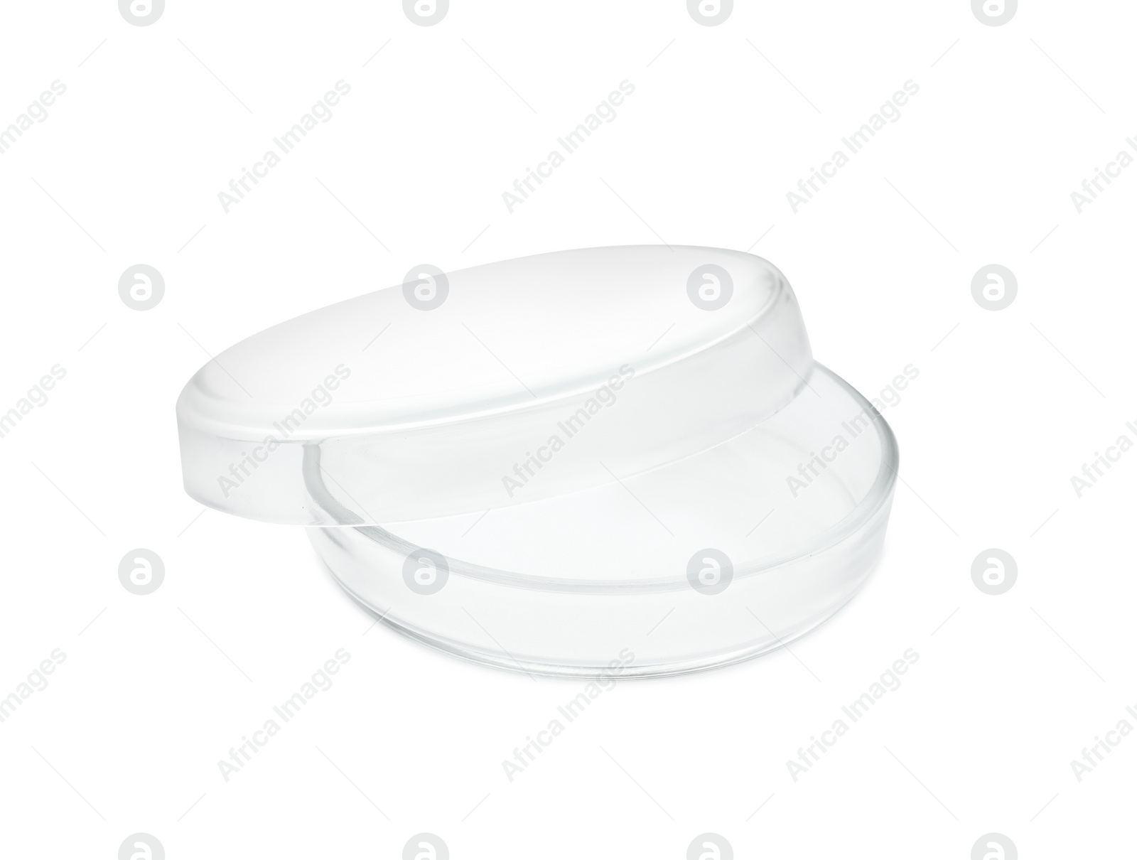 Photo of Empty glass Petri dishes isolated on white