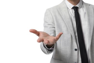 Photo of Businessman holding something on white background, closeup