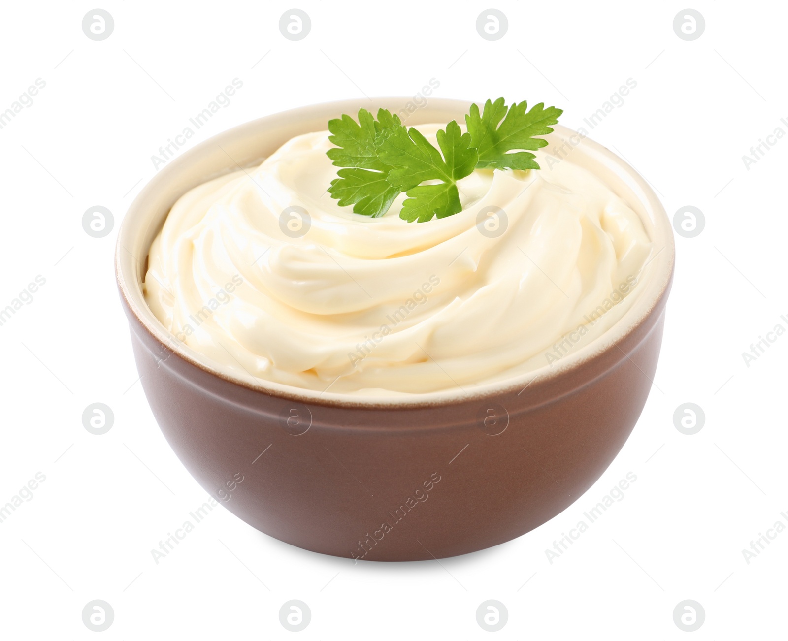 Photo of Bowl with delicious mayonnaise and parsley isolated on white