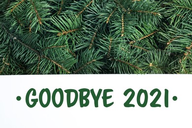 Image of Card with phrase Goodbye 2021 on Christmas tree branches, top view