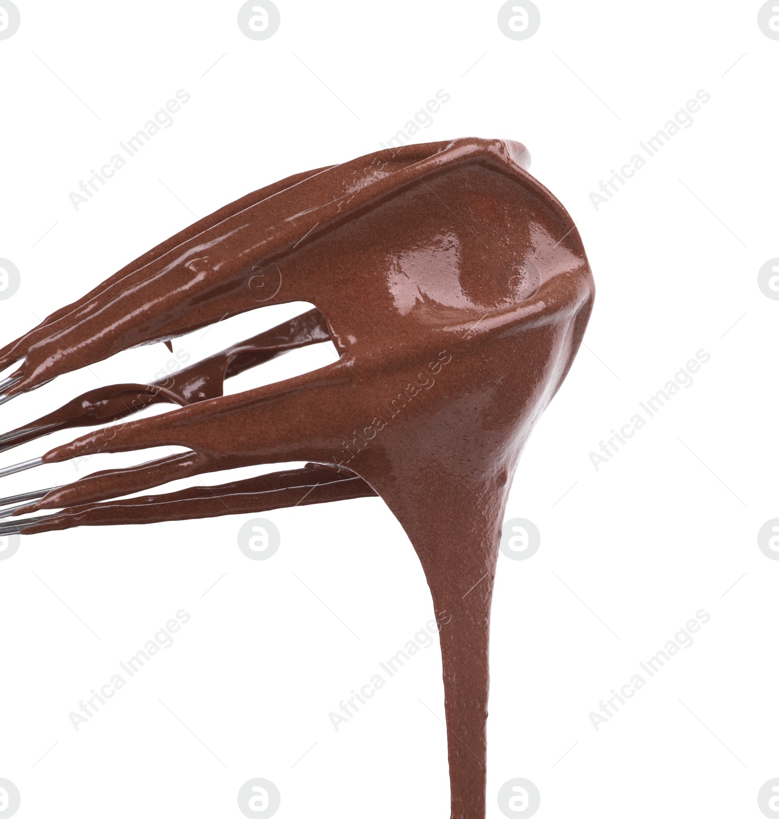 Photo of Chocolate cream flowing from whisk isolated on white
