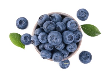 Photo of Fresh ripe blueberries and leaves isolated on white, top view