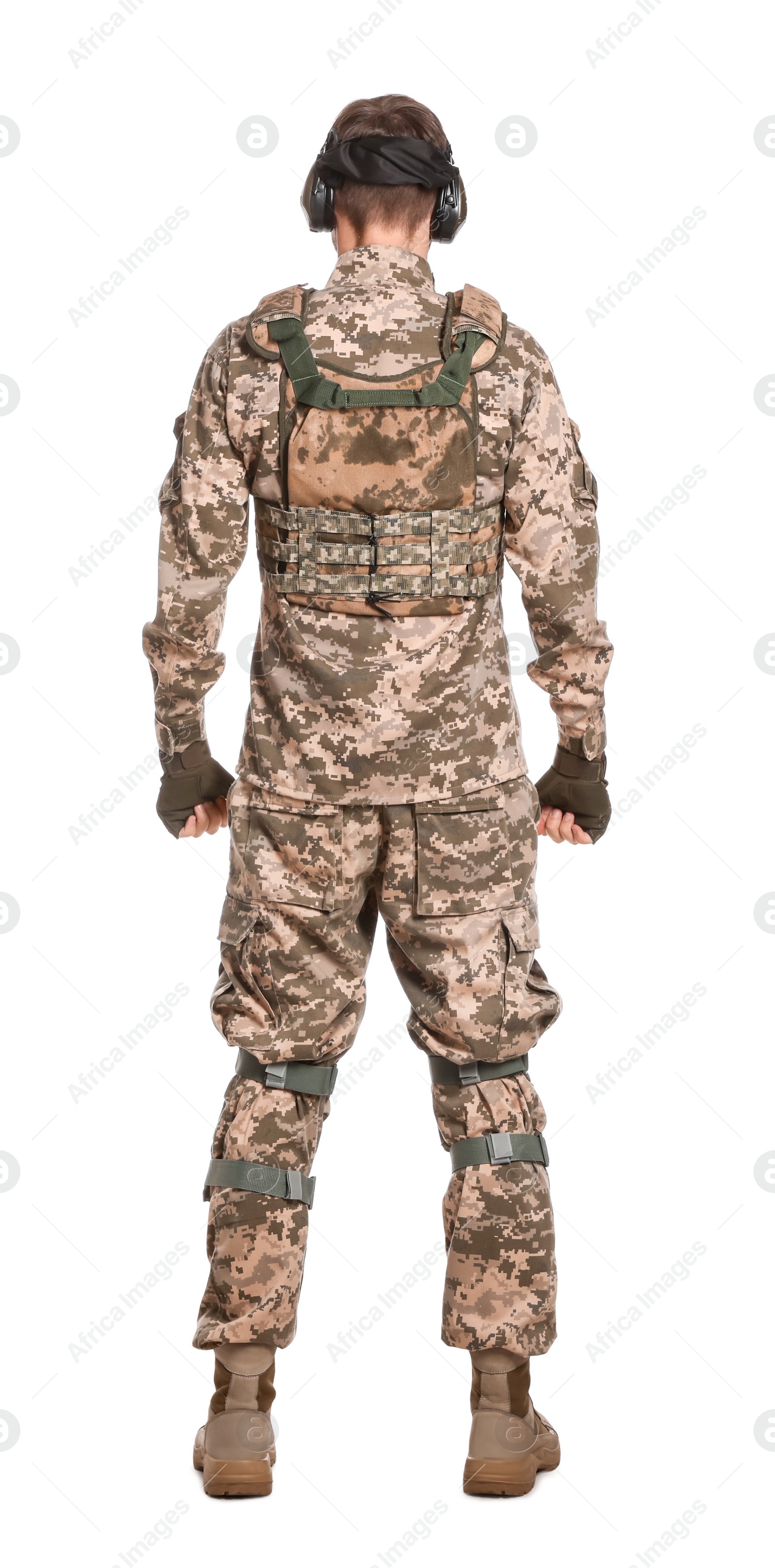 Photo of Soldier in Ukrainian military uniform and tactical headphones on white background, back view