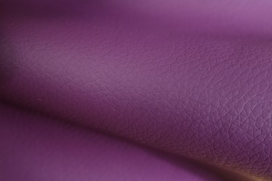 Photo of Beautiful purple leather as background, closeup view